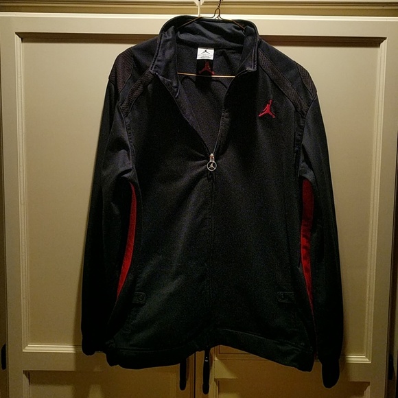 black jordans with red stripe